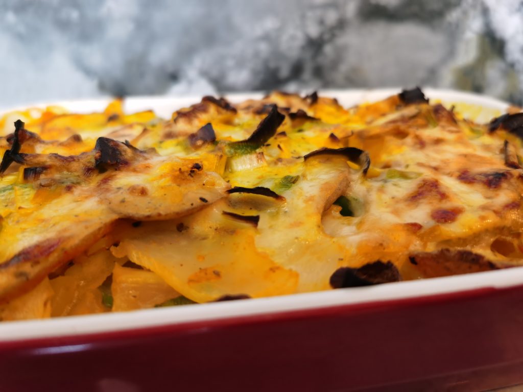 Turnip, potato and leek gratin goodfood closeup of cooked gratin