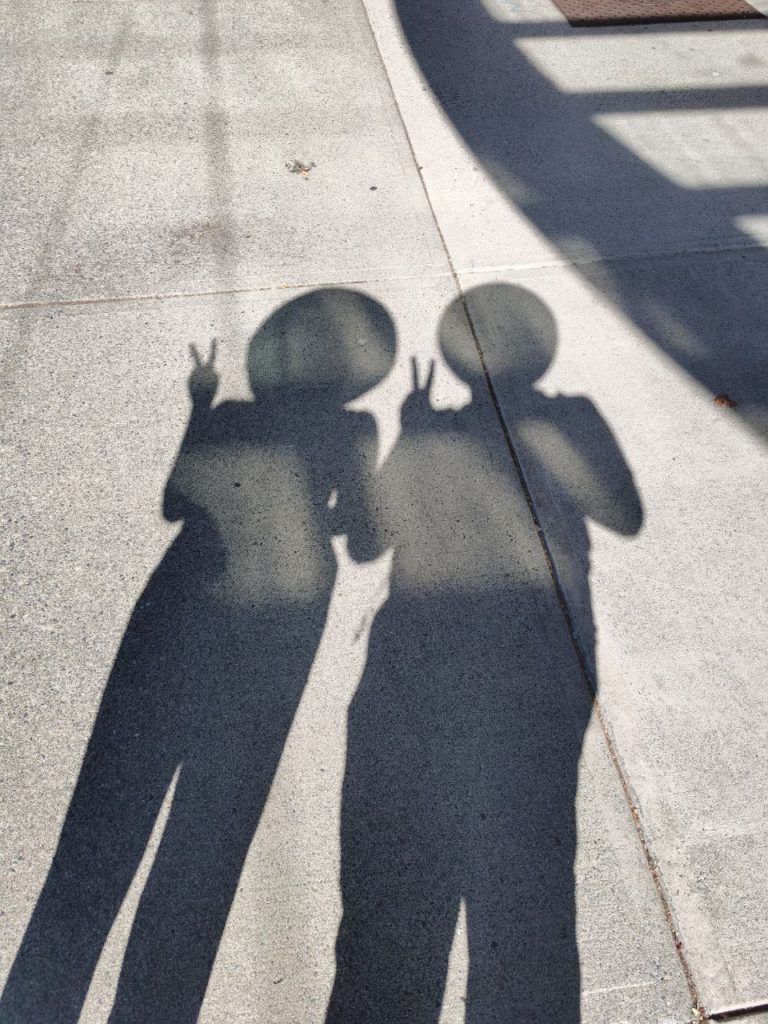 Two People Shadows In Vancouver Outside