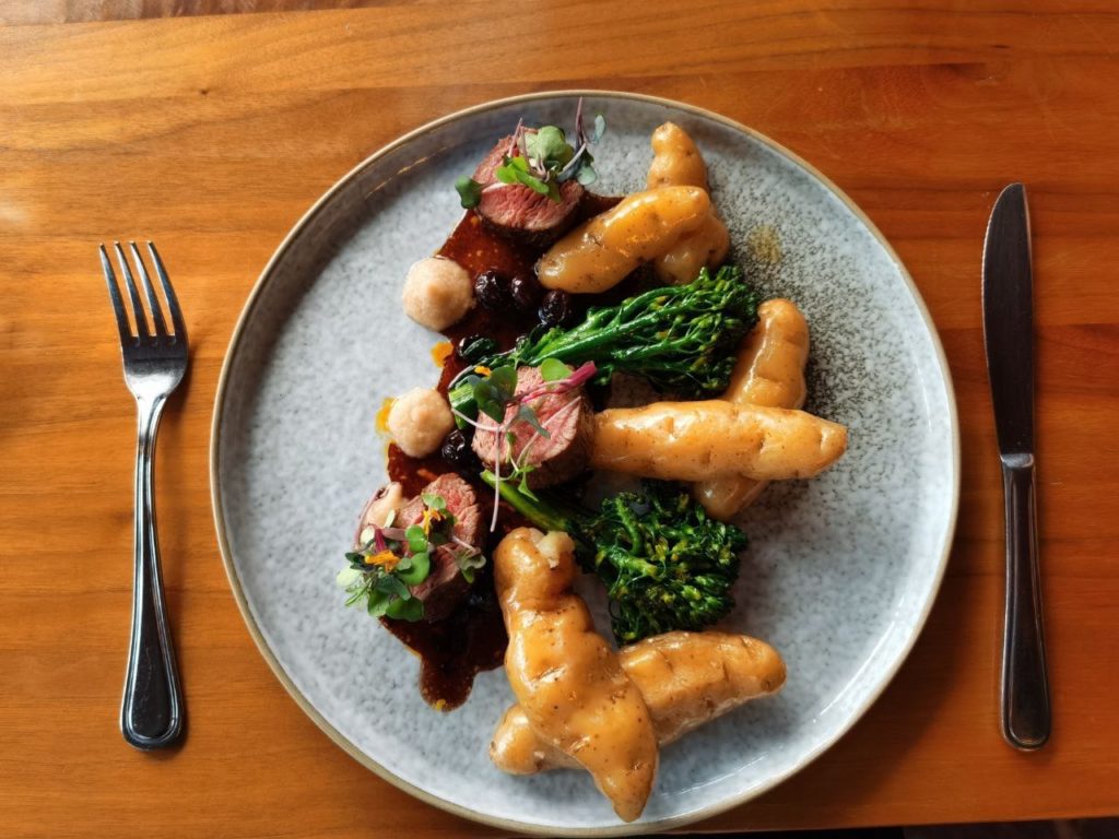 bison meal from the pines restaurant meal on wooden table