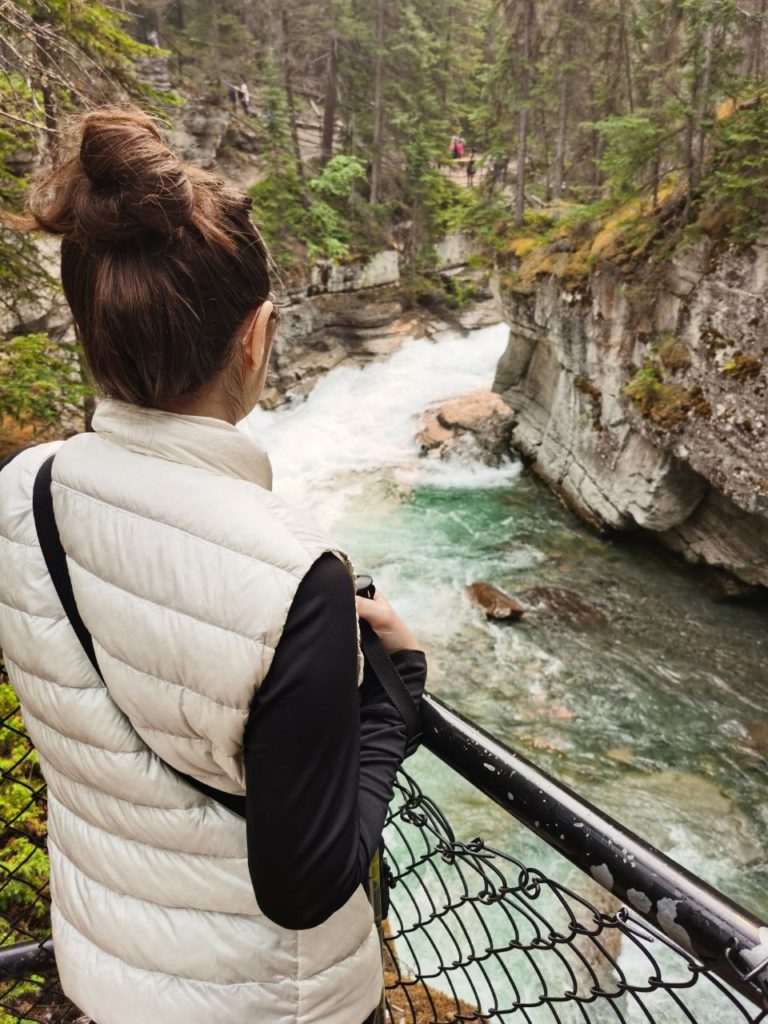 Maligne Canyon lady staring out at water