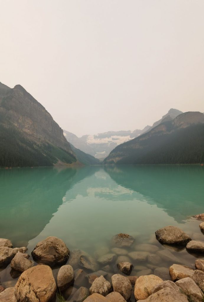 Lake Louise Waterfront with a smokey sky in Banff National Park