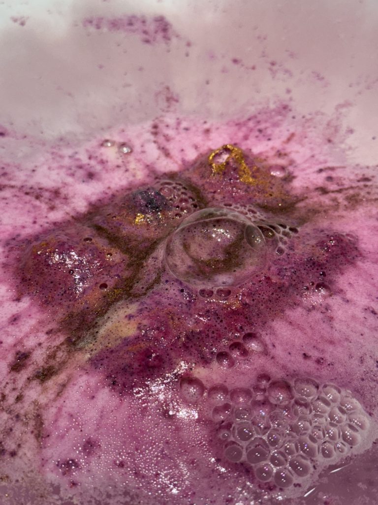 Grimoire Bath bomb in the bath with bubble