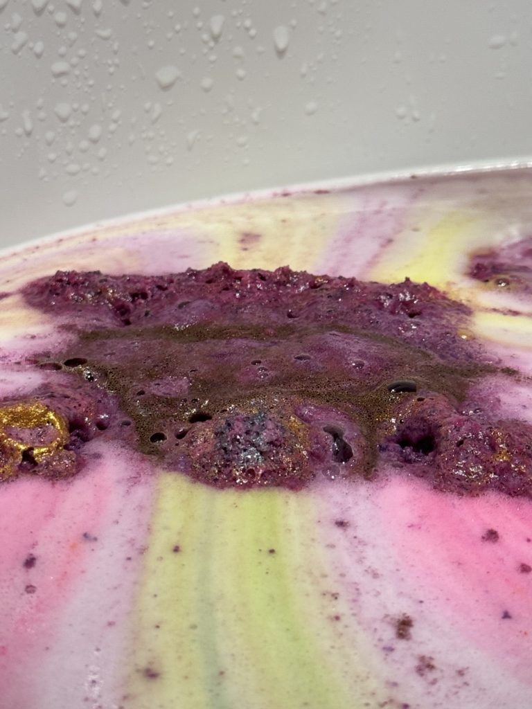 Grimoire Bath bomb in the bath disintegrating